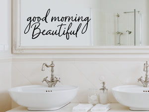 Wall decals for bathroom that say ‘Good Morning Beautiful’ in a cursive font on a bathroom wall.