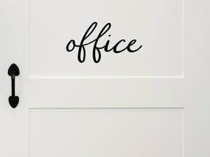 Wall decal for the office that says ‘Office’ in a script font on an office door. 