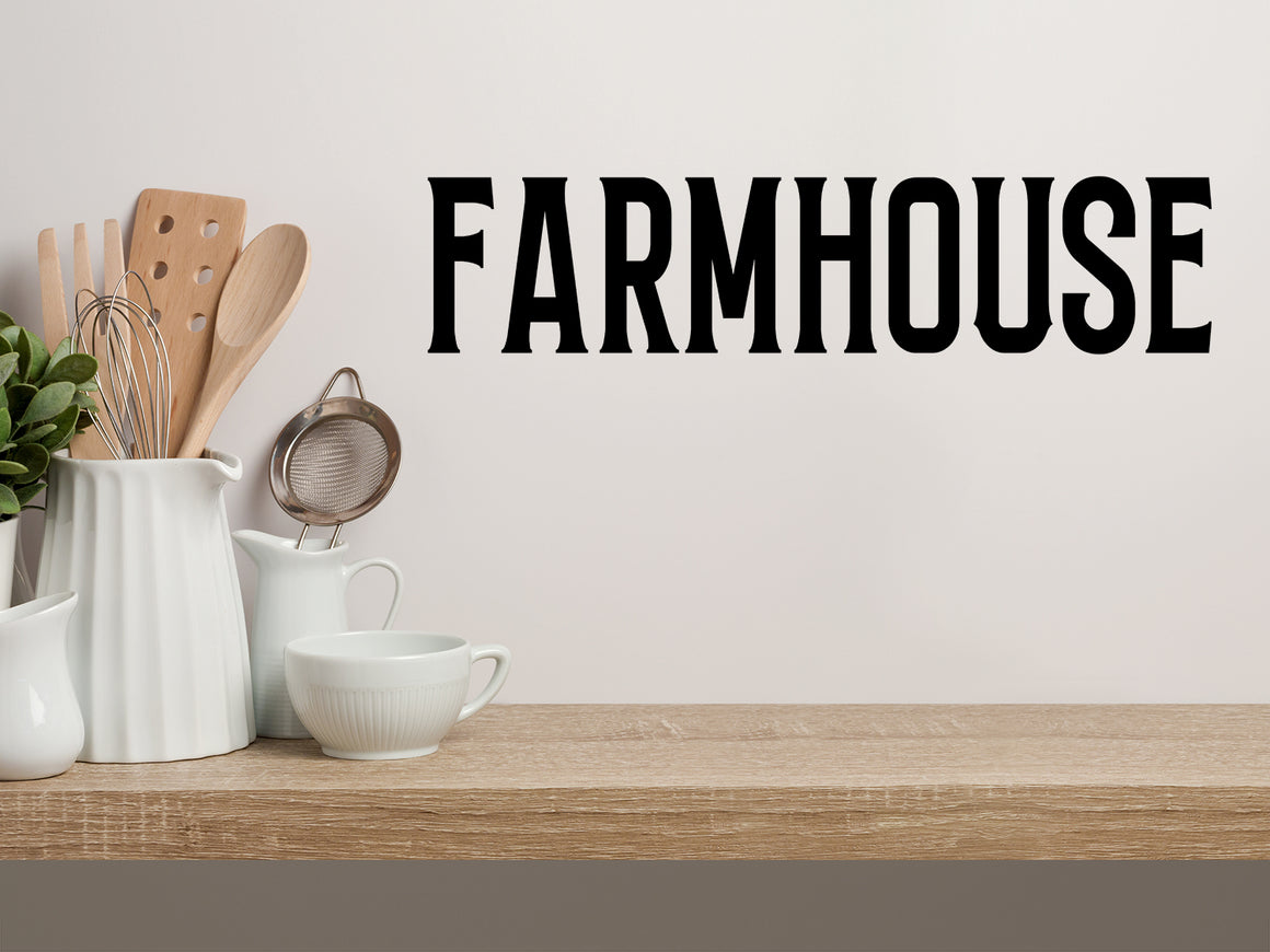 Wall decals for kitchen that say ‘Farmhouse’ in a bold font on a kitchen wall.