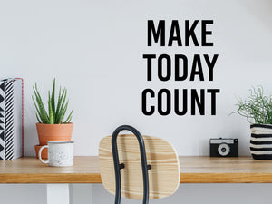 Wall decal for the office that says ‘Make Today Count’ in a bold font on an office wall.