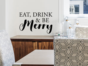 Wall decals for kitchen that say ‘eat drink & be merry’ on a kitchen wall.