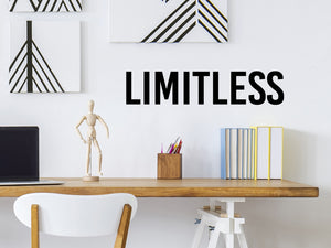 Wall decal for the office that says ‘Limitless’ in a print font on an office wall.