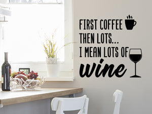 Wall decals for kitchen that say ‘first coffee then lots I mean lots of wine’ on a kitchen wall.