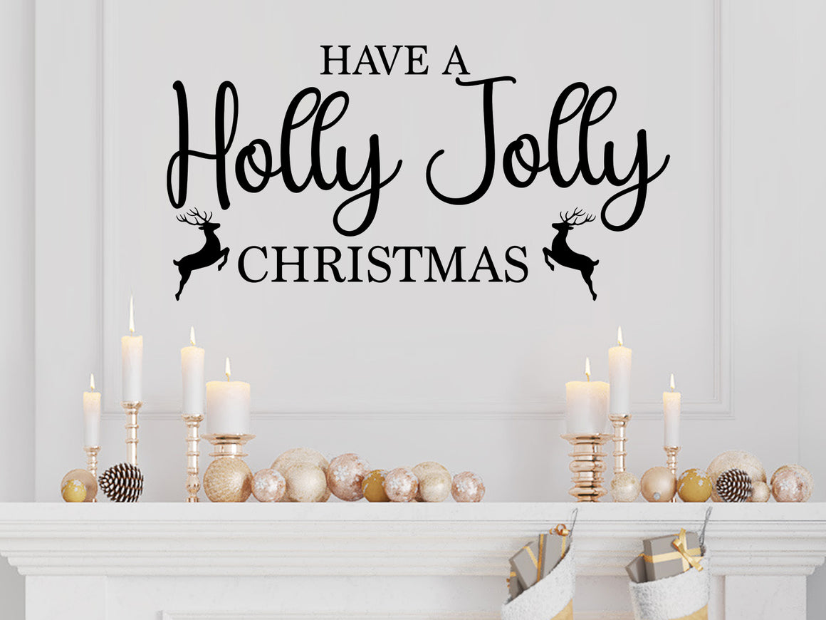 Living room wall decals that say ‘Have A Holly Jolly Christmas’ in a script font on a living room wall. 