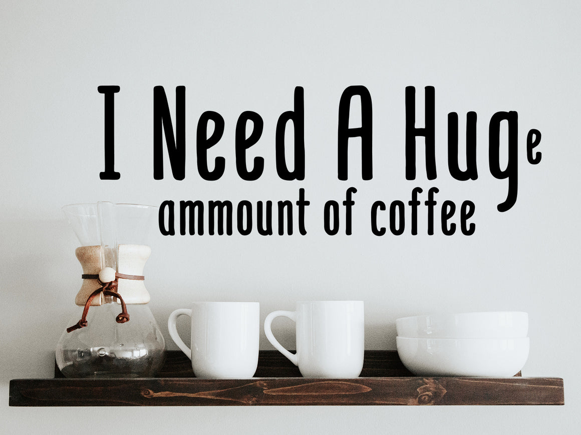 Decorative wall decal that says ‘I Need A Huge Amount Of Coffee’ on a kitchen wall.