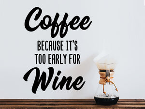 Wall decals for kitchen that say ‘coffee because it's too early for wine’ on a kitchen wall.