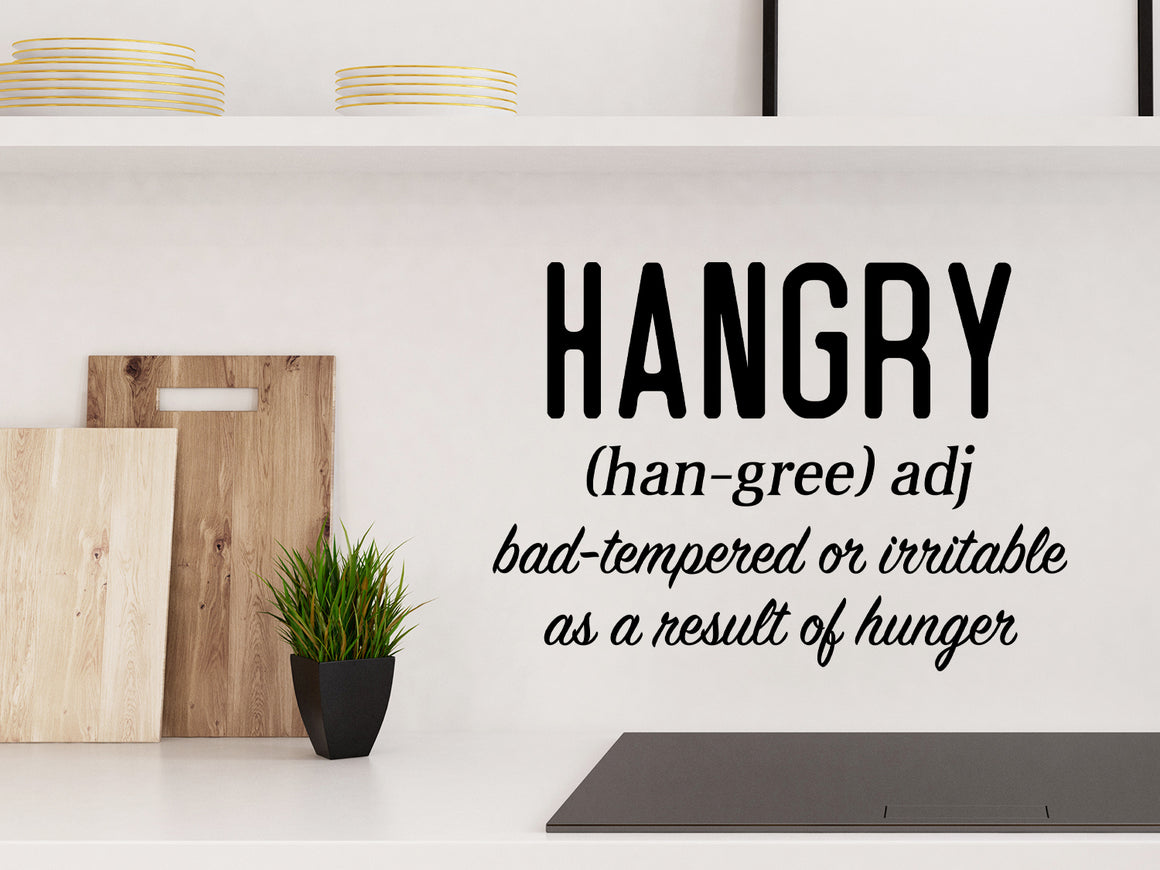 Wall decals for kitchen that say ‘Hangry Definition’ in a cursive font on a kitchen wall.