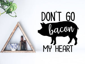 Wall decals for kitchen that say ‘don't go bacon my heart’ on a kitchen wall.