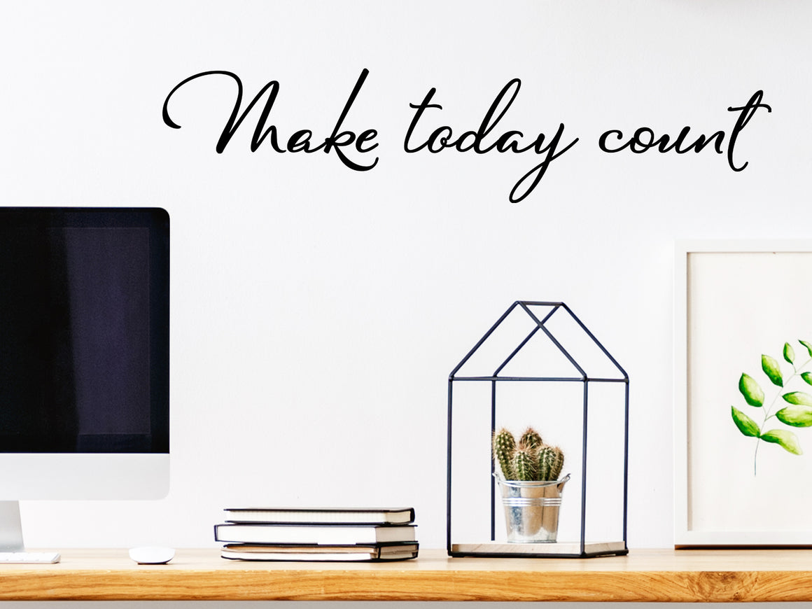 Wall decal for the office that says ‘Make Today Count’ in a cursive font on an office wall.