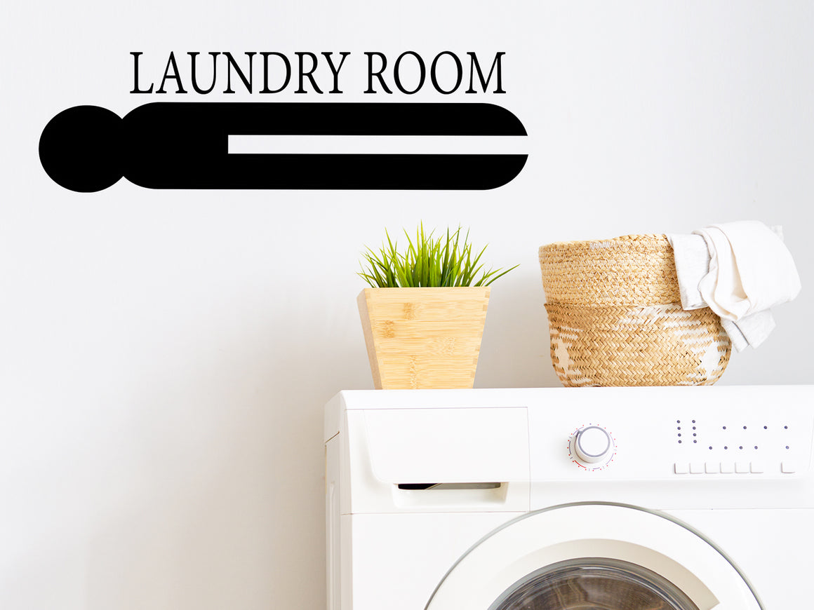 Laundry room wall decal that says ‘Laundry Room (ClothesPin)’ on a laundry room wall.