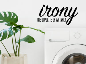 Laundry room wall decal that says ‘Irony The Opposite Of Wrinkly’ on a laundry room wall.