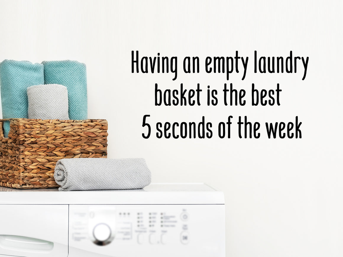 Laundry room wall decal that says ‘Having An Empty Laundry Basket Is The Best Five Seconds Of The Week’ on a laundry room wall