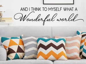 Living room wall decals that say ‘And I think to myself what a wonderful world’ on a living room wall. 