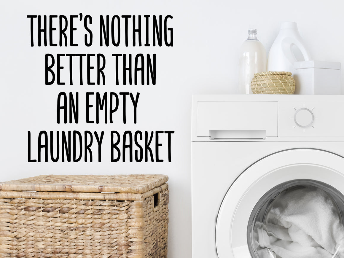Decorative wall decal that says ‘There's Nothing Better Than An Empty Laundry Basket’ on a laundry room wall.