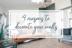 A living room with an image overlaid that says ‘4 reasons to decorate your walls’. 