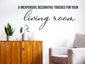 Living room wall decals that say ‘5 inexpensive decorative touches for your living room’ on a living room wall. 