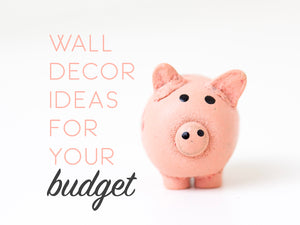 Image of a pink pig with words in pink and black that say, 'wall decor ideas for your budget.'