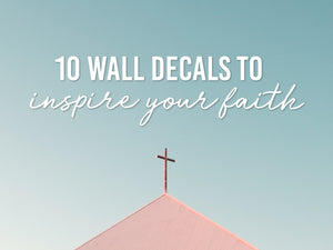 An image of a steeple with white words written over a blue background that say, '10 wall decals to inspire your faith'
