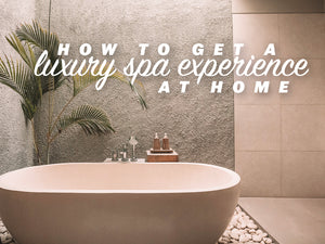 Wall decals for bathroom that say ‘how to get a luxury spa experience at home’ on a bathroom wall.