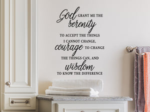 Wall decals for the bathroom that say 'God grant me the serenity to accept the things I cannot change courage to change the things I can and wisdom to know the difference' on a bathroom wall. 