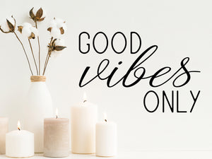 Wall decals for the bathroom that say ‘good vibes only’ on a bathroom wall.