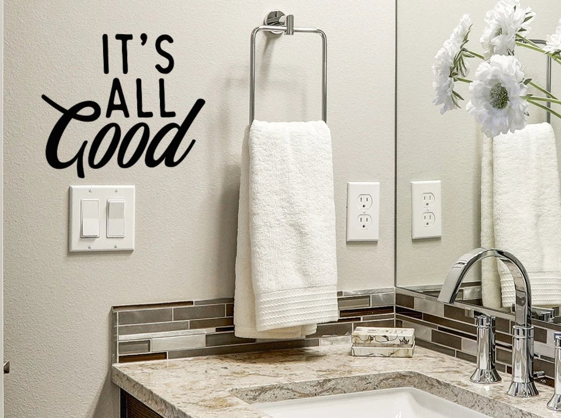 Wall decals for the bathroom that say ‘it's all good’ on a bathroom wall.