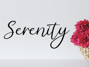 Wall decals for bathroom that say ‘serenity’ on a bathroom wall.