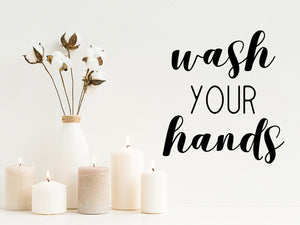 Wall decals for bathroom that say ‘wash your hands’ on a bathroom wall.