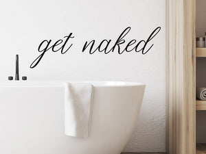 Wall decals for the bathroom that say ‘get naked’ on a bathroom wall.