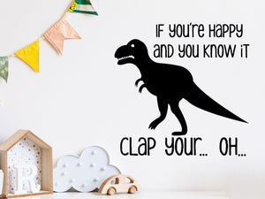 Wall decal for kids that says ‘if you're happy and you know it clap your...oh...’ on a kid’s room wall. 