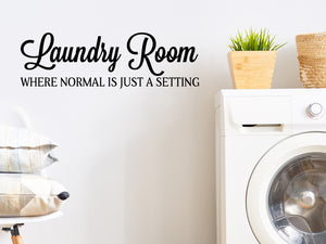 Laundry room wall decal that says ‘Laundry Room Where Normal is just a Setting’ on a laundry room wall