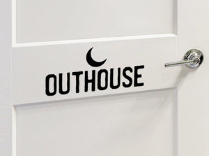 Wall decal for the bathroom door that say, 'outhouse' on a bathroom door.