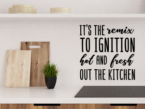 Decorative wall decal that says ‘It's The Remix To Ignition Hot And Fresh Out The Kitchen’ on a kitchen wall.