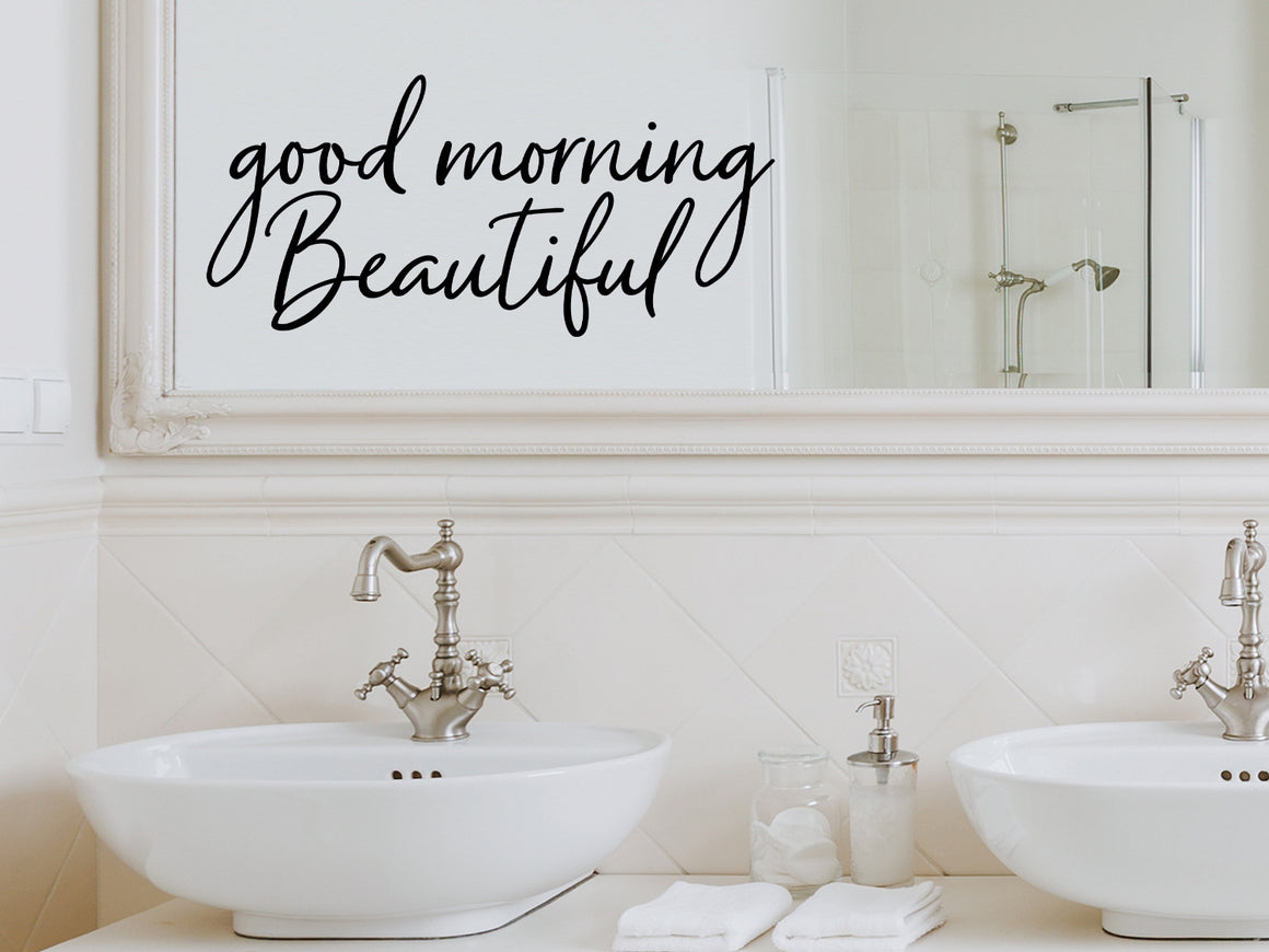 Wall decals for bathroom that say ‘Good Morning Beautiful’ in a cursive font on a bathroom wall.