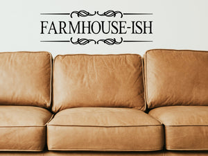 Living room wall decals that say ‘Farmhouse-ish’ with a ribbon design on a living room wall. 