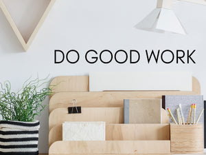 Wall decal for the office that says ‘Do Good Work’ in a print font on an office wall.