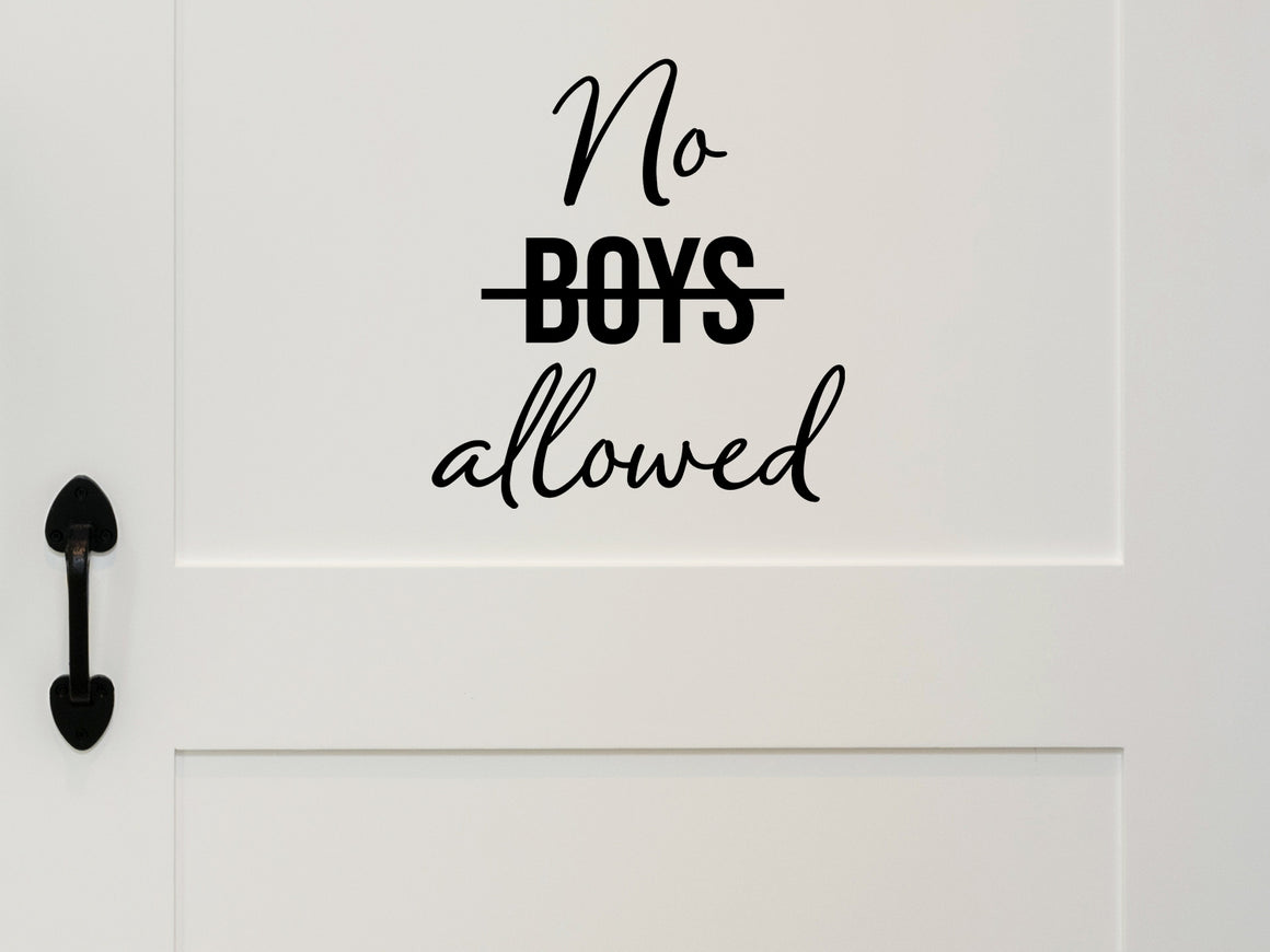 Wall decal for kids that says ‘No Boys Allowed’ on a kid’s room wall. 