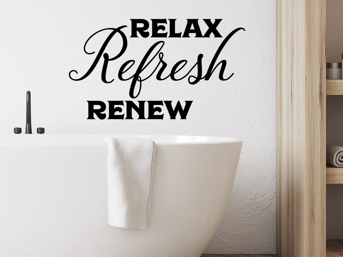 Wall decals for bathroom that say ‘relax refresh renew’ on a bathroom wall.