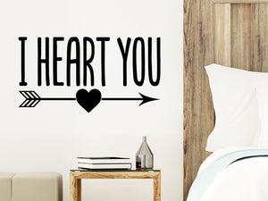 Wall decal for bedroom that says ‘I heart you’ on a bedroom wall.