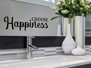 Wall decals for bathroom that say ‘Choose Happiness’ in a script font on a bathroom wall.