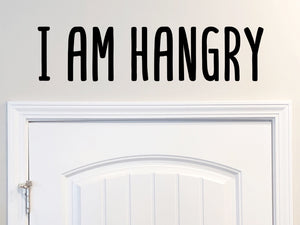 Decorative wall decal that says ‘I Am Hangry’ on a kitchen wall.