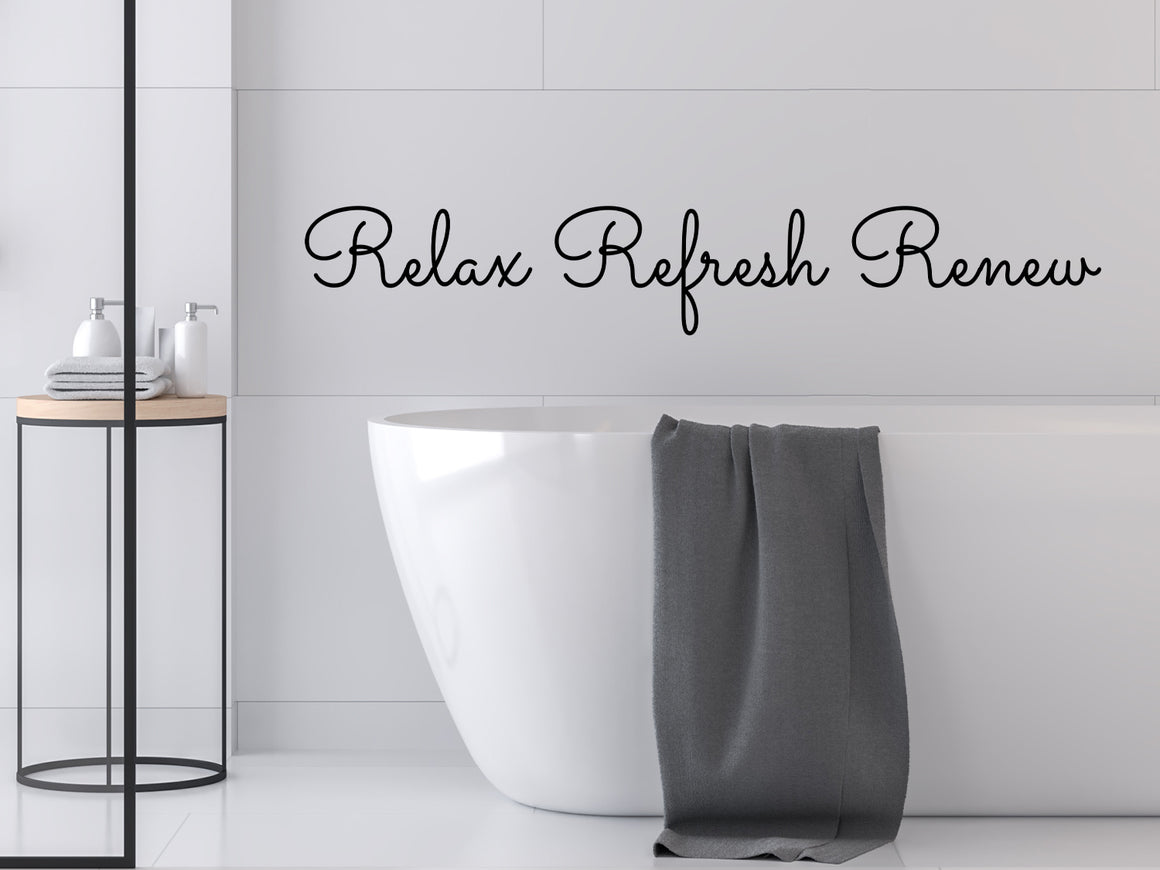 Wall decals for bathroom that say ‘Relax Refresh Renew’ in a modern design on a bathroom wall.
