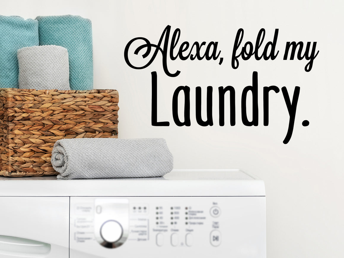 Laundry room wall decal that says ‘Alexa, fold my laundry’ on a laundry room wall.