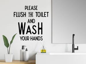 Wall decals for the bathroom that say 'please flush the toilet and wash your hands' on a bathroom wall.