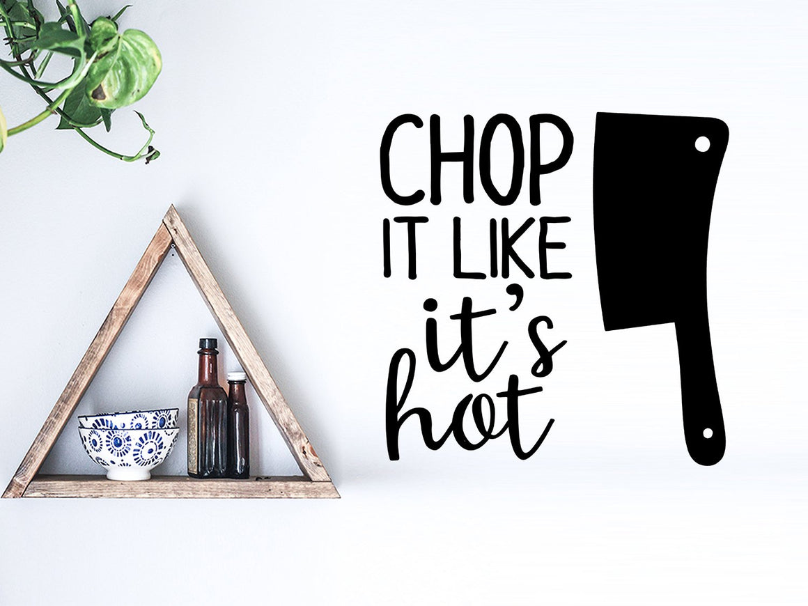 Wall decals for kitchen that say ‘chop it like it's hot’ on a kitchen wall.