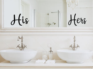Wall decal for the bathroom mirror that says ‘his’ and a Wall decal for the bathroom mirror that says ‘hers’ on a bathroom mirror