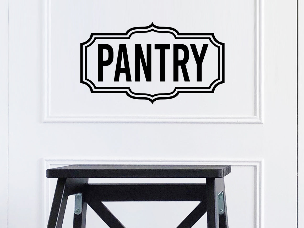 Wall decals for kitchen that say ‘pantry’ with a scallop design on a kitchen wall.