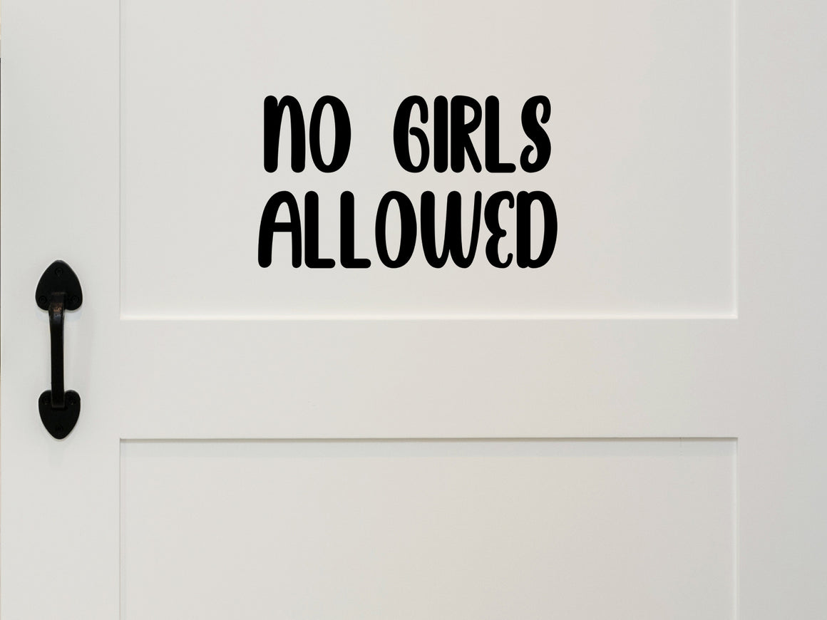 Wall decal for kids that says ‘No Girls Allowed’ in a bold font on a kid’s room wall. 