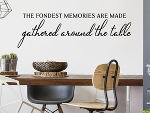 Wall decals for kitchen that say ‘The Fondest Memories Are Made Gathered Around The Table’ in a cursive font on a kitchen wall.