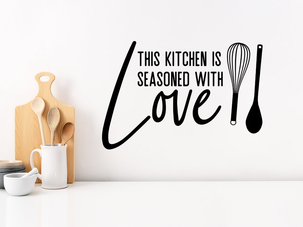 Wall decals for kitchen that say ‘This Kitchen Is Seasoned With Love’ on a kitchen wall.